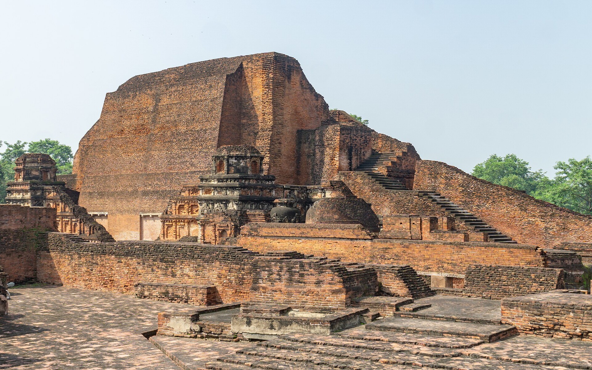 The brick ruins of the Sariputta Stupa at Nalanda, tinted in brick red